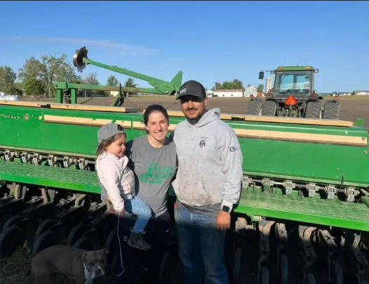 Saul Triana with his family at the farm